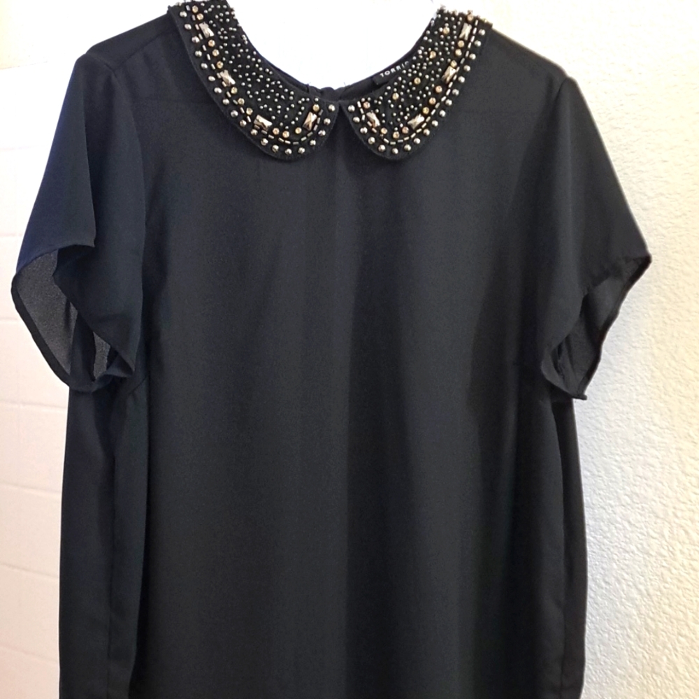 Torrid black blouse with studded collar.